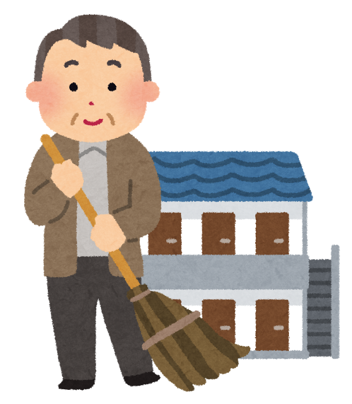 自宅の周辺を掃き掃除する男性